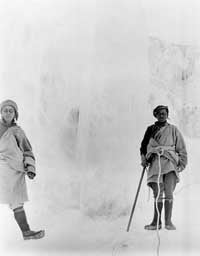 Tibetan porters roped up on snow